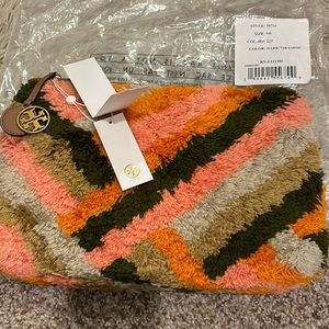 Tory Burch Sadie rug clutch NWT and original interior packing.